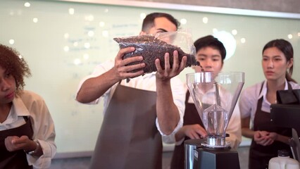Group of barista or bartender students having a workshop how to brew and test coffee with professional - expert barista.