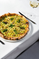Pizza with jalapeno and pistachios