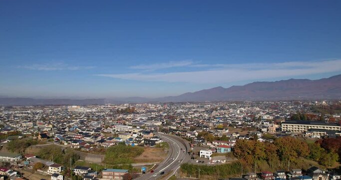 空撮 - 日本の都市風景 長野県佐久市 秋の風景 観光 ビジネス 上昇