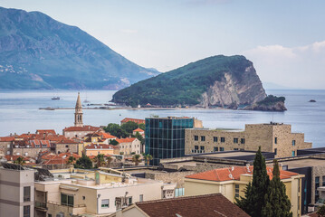Obraz premium Aerial view of Budva town on the Adriatic shore, Sveti Nikola Island on background, Montenegro