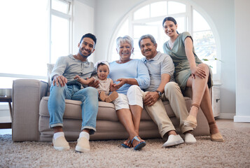 Positive environment for the ultimate growth. Shot of a family spending time together on a sofa at home.
