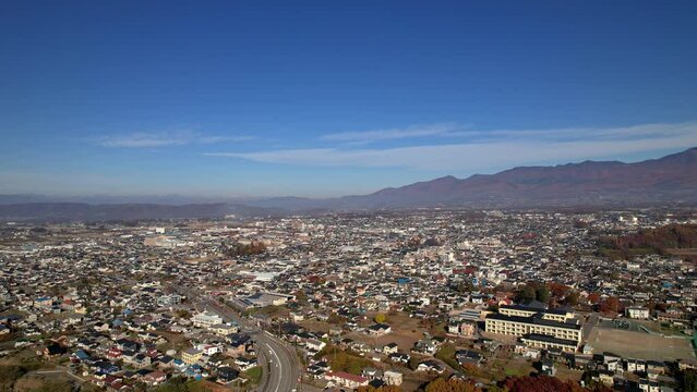 空撮 - 日本の都市風景 長野県佐久市 秋の風景 観光 ビジネス 右ドリー