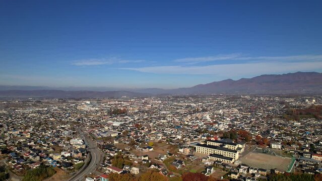 空撮 - 日本の都市風景 長野県佐久市 秋の風景 観光 ビジネス 左ドリー