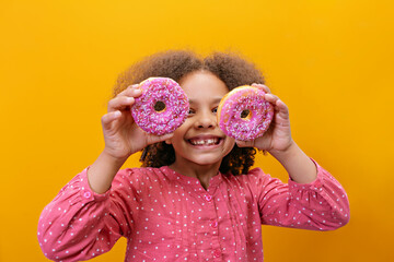 This doughnut makes her mouth water. Euphoria in anticipation of sweetness. Great mood like on a holiday.