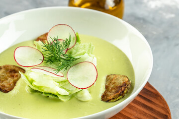 green vegetable cream soup puree, Healthy vegetarian food concept. Food recipe background. Close up