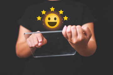 Customer pressing satisfaction with gold five star rating feedback icon and press level excellent rank for giving best score point to review the service , experience success business rate  concept.