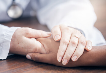 I know youre anxious, but you can trust me. Closeup shot of an unrecognisable doctor holding a patients hand in comfort.