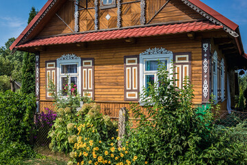 Wooden house in Soce village, famous for traditional architecture, Podlasie region of Poland