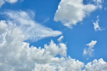 White clouds against blue sky for a backgrounds.