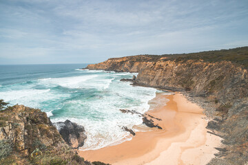Rugged, unique rock and cliff coastline on the Atlantic Ocean in the west of Portugal in the famous tourist region of the Algarve. In the footsteps of the Fisherman Trail