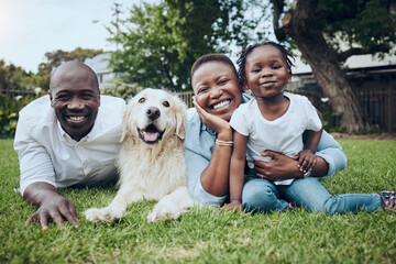 Thats the smile that lights up my world. Shot of a having a family having fun at home with their dog.