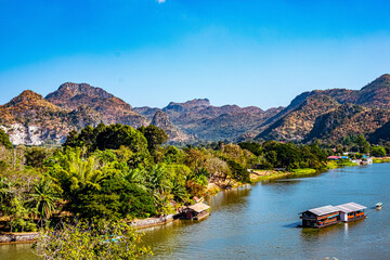 The beautiful landscape in the morning of the Kwai Noi River curve and the mountains