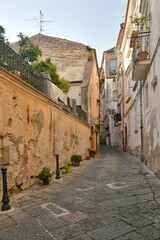 A narrow street among the old houses of Sessa Aurunca, a small town of Caserta province, Italy.