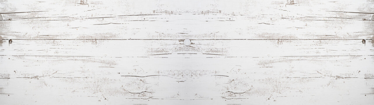 Old white painted exfoliate rustic bright light wooden boards wall  texture - Shabby wood background panorama long