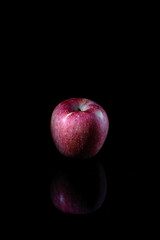 Fototapeta na wymiar red apple isolated on black