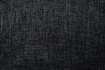Fototapeta na wymiar Texture of natural weave cloth in dark color