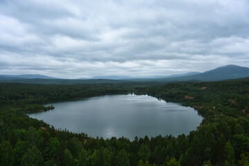 Fototapeta na wymiar Cloud day at Karelka pond