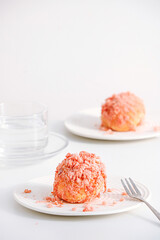 table with pink cakes and drinks