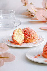 table with pink cakes and drinks