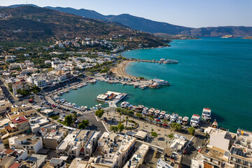 Aerial view of the harbour in the holiday town of Elounda on the Greek island of Crete