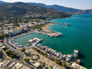 Fototapeta na wymiar Aerial view of the harbour in the holiday town of Elounda on the Greek island of Crete