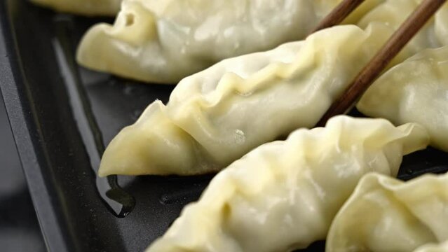 Chinese cuisine: fried dumplings video