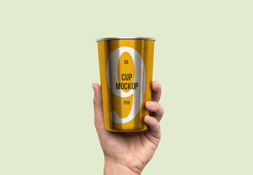 Hand Holding Metal Cup