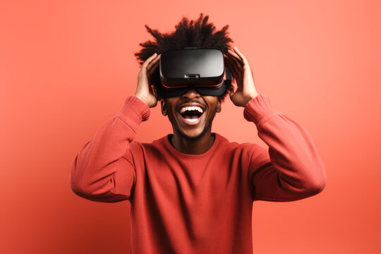 Generative AI image of excited young African American male with Afro style hair standing in VR goggles while experiencing virtual reality in cyberspace against pink background