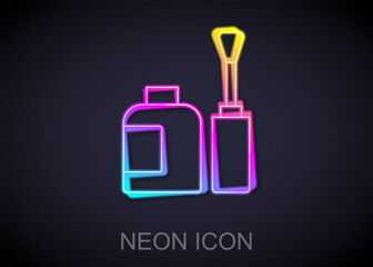 Glowing neon line Bottle of nail polish icon isolated on black background. Vector