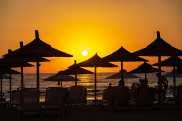 umbrellas and sunset on the beach