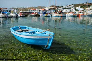 Fototapeta na wymiar Greek fishing boat in port of Mykonos