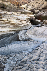 rock eroded by the flow of water