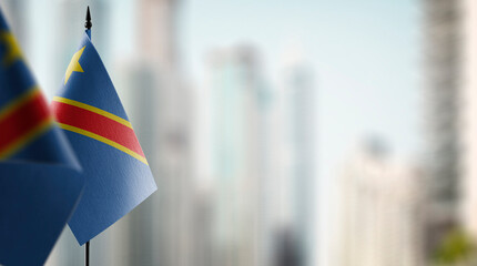 A small Democratic Republic of the Congo flag on an abstract blurry background