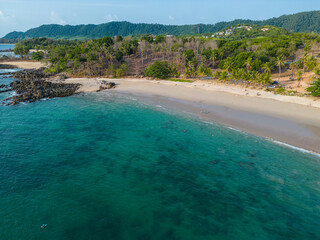 Aerial view white sand beach palm tree turquoise water