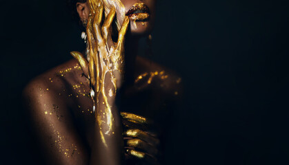 art fantasy portrait african american woman goddess. female hands close-up, fingers in golden...