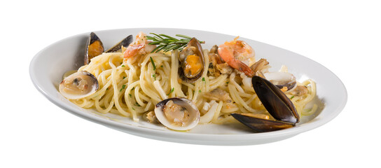 Spaghetti with clams, shrimps and herbs isolated on a white background