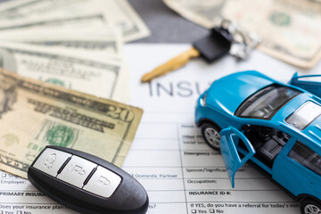 Car and money. Concept for buying, renting, insurance, fuel, service and repair costs.