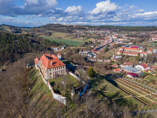 Fototapeta na wymiar A spring day in Moravia with beautiful view of city Kunstat and old baroque chateau. Czech republic.