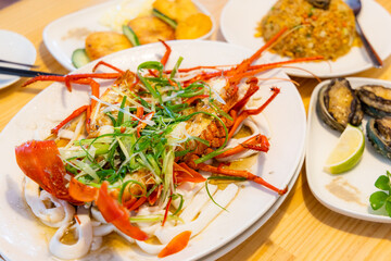 Chinese style seafood arranged dishes in restaurant