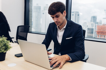 Fototapeta premium Business people using smart phone or computer for Chat GPT Chat with AI or Artificial Intelligence. Chat GPT, artificial intelligence Ai Chat GPT, AI technology to assist humans work. 