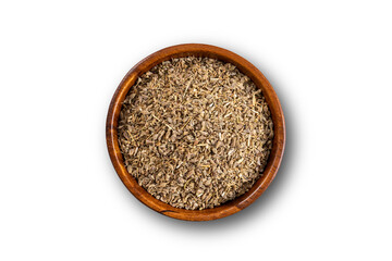 Anise seed on wooden bowl. Up view studio shoot isolated on white background.