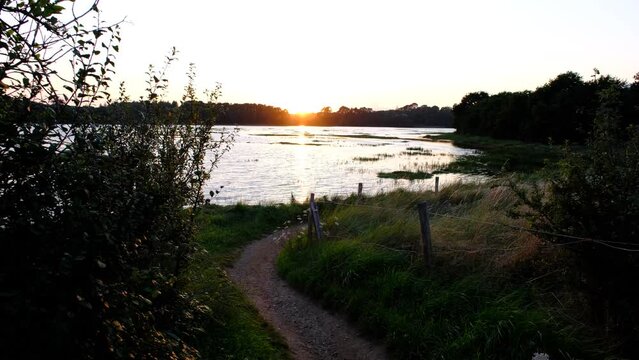 river in the forest. Morbihan, france. City of Auray, river of Auray. Sunset