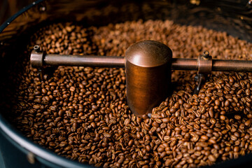 Coffee production is the process of roasting fresh coffee beans coffee beans are mixed and cooled close-up