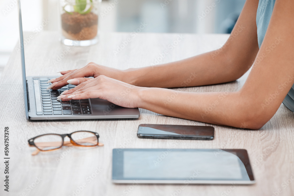 Poster Closeup of mixed race business womans hands and fingers typing on laptop keyboard at a table in an office. One female only sending emails while busy with research and planning online for her startup