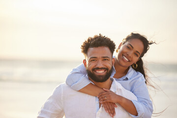 They move like lovers set on fire. Shot of a couple enjoying a day at the beach together.