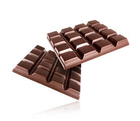 Two bars of dark chocolate close-up isolated on white background