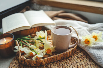 Cup of hot tea and spring home interior. good morning concept