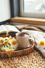 Bible, flowers, cup of tea. Christian good morning concept