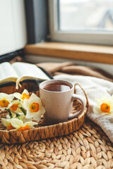 Bible, flowers, cup of tea. Christian good morning concept