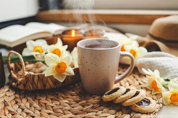 Cup of hot tea and spring home interior. good morning concept